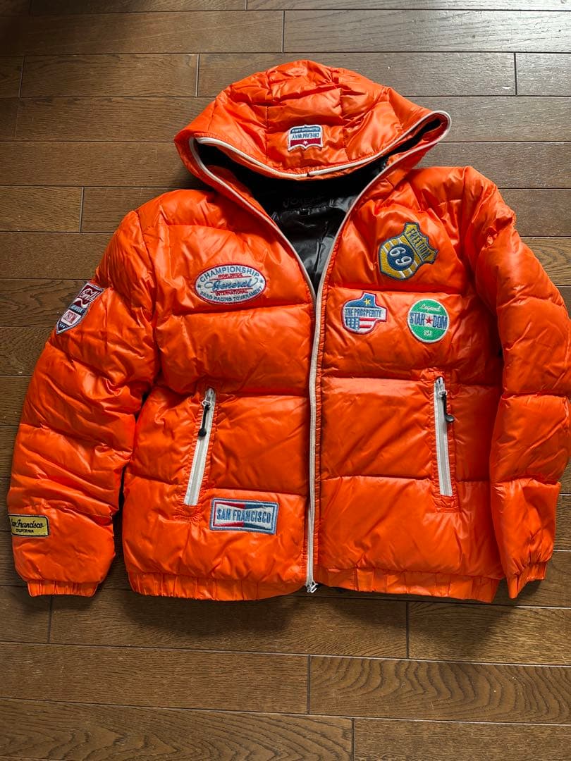 オレンジ フード付き ダウンジャケット - メルカリ