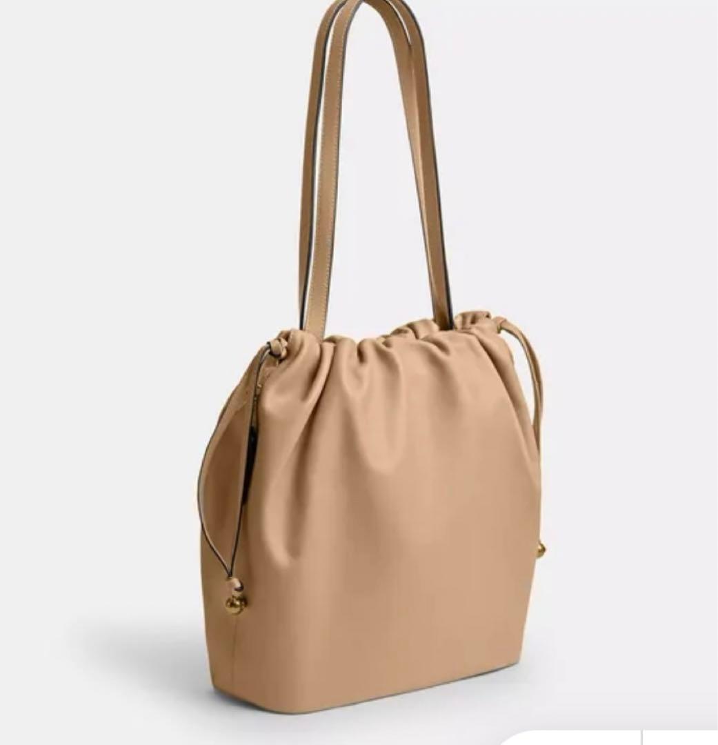 ひ*ん様 COACH フェイ ドローストリング トートバッグ カラー:タン