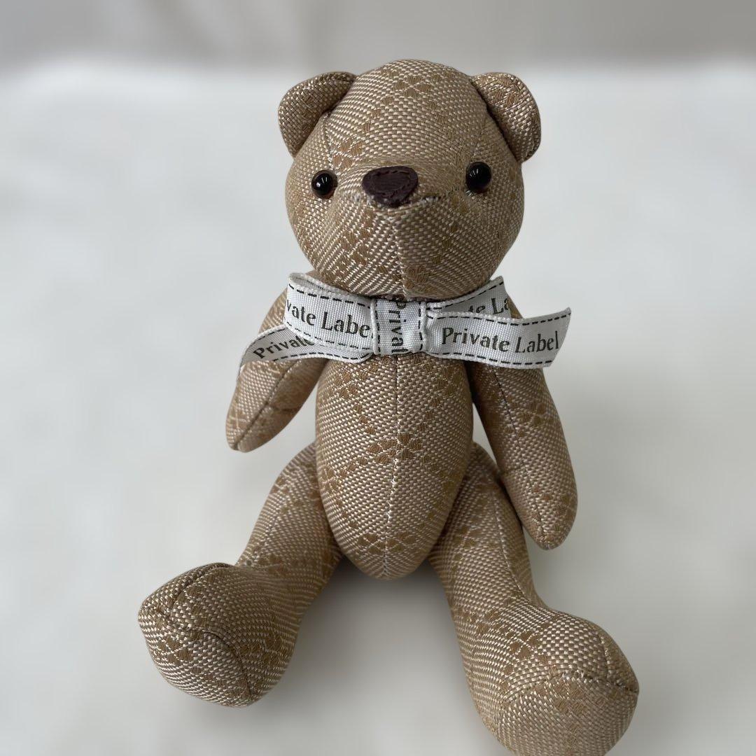 ベージュ クマ型ぬいぐるみ リボン付きと黄色のくま - メルカリ