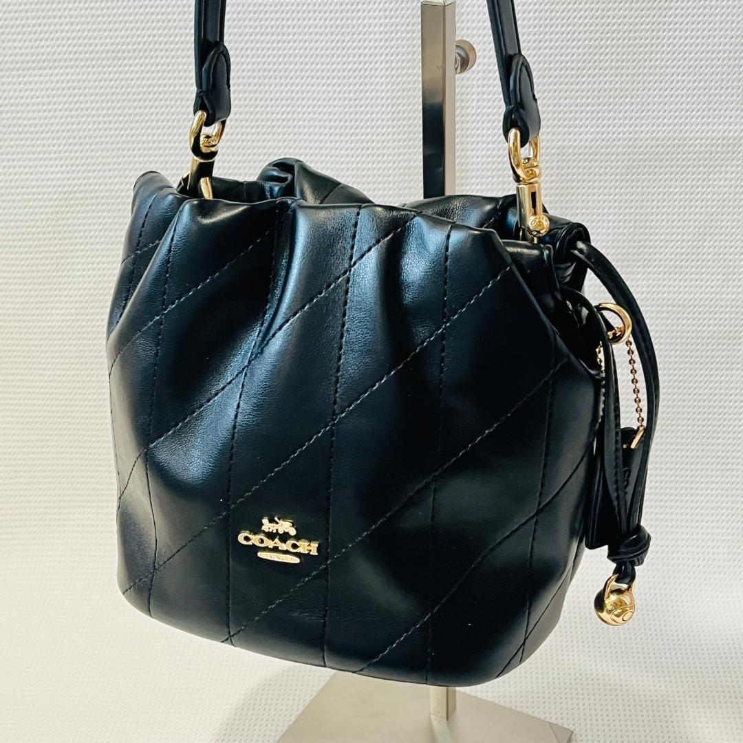 未使用 COACH キルティング 黒 フェイ ミニ ドローストリング バッグ
