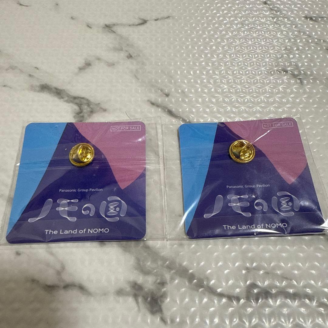 非売品》パナソニックパビリオン 万博 ノモの国 ピンバッジ - メルカリ