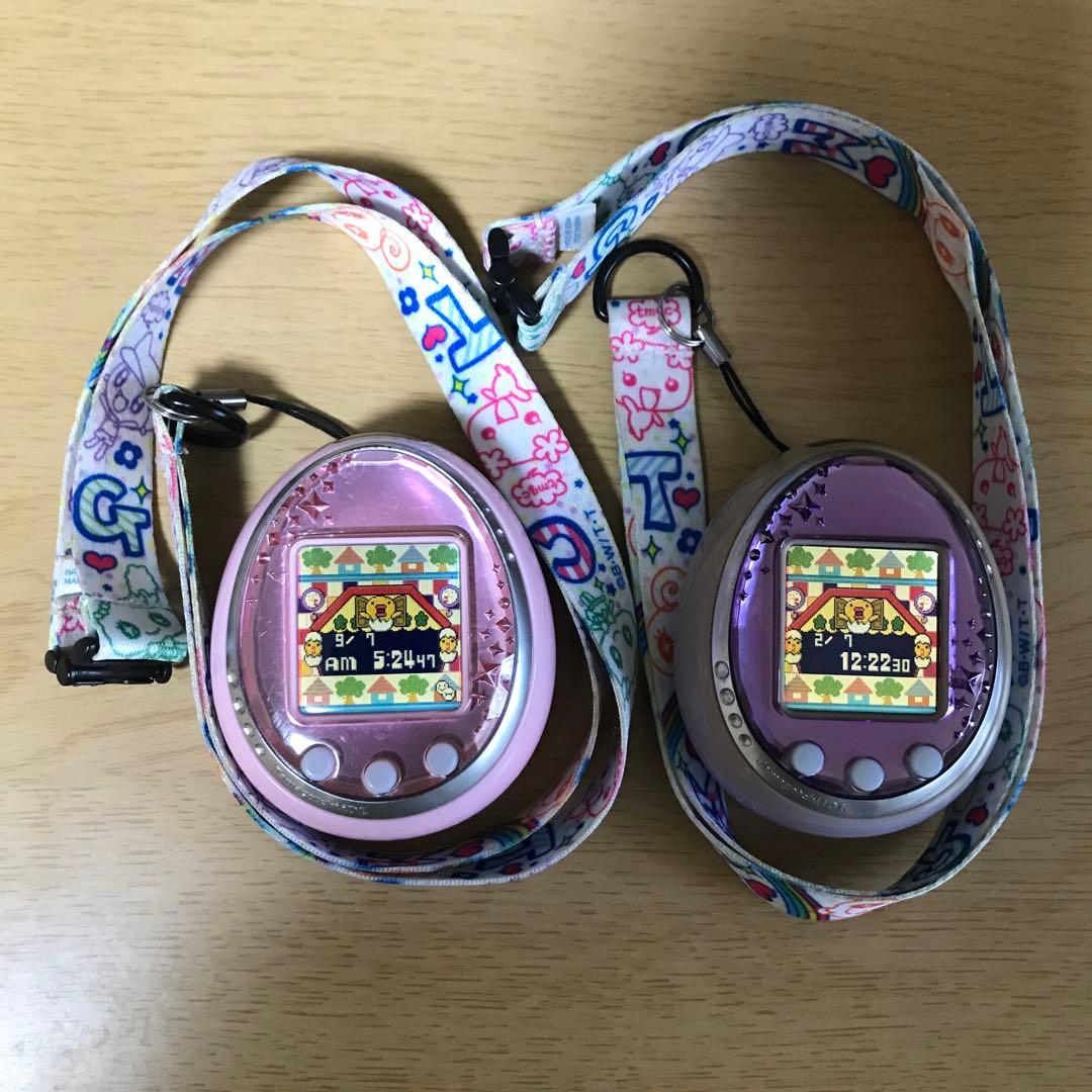 たまごっち iD L 2個 セット ピンク パープル ストラップ付き - メルカリ