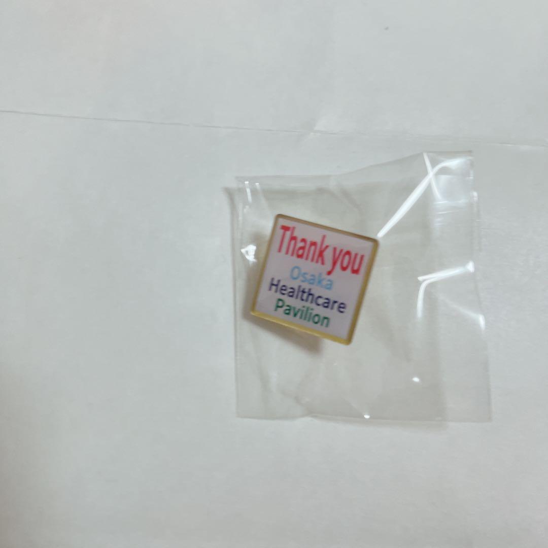 大阪ヘルスケアパビリオン ピンバッジ - メルカリ