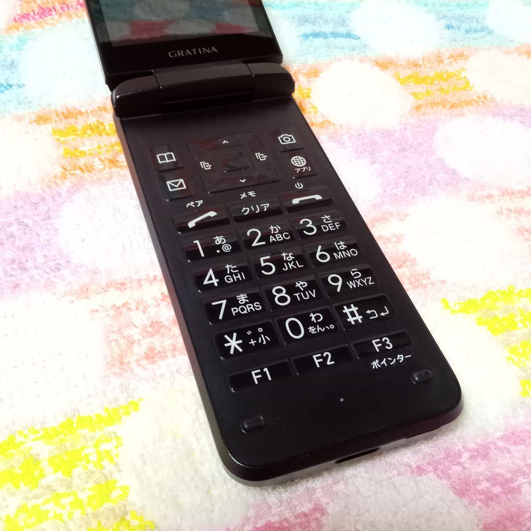 KYF42 GRATINA black 充電器セット 安心のメルカリ便 匿名配送 - メルカリ