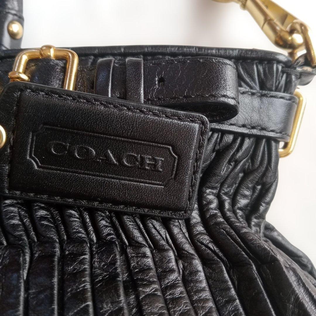 COACH ブラック レザー ハンドバッグ - メルカリ
