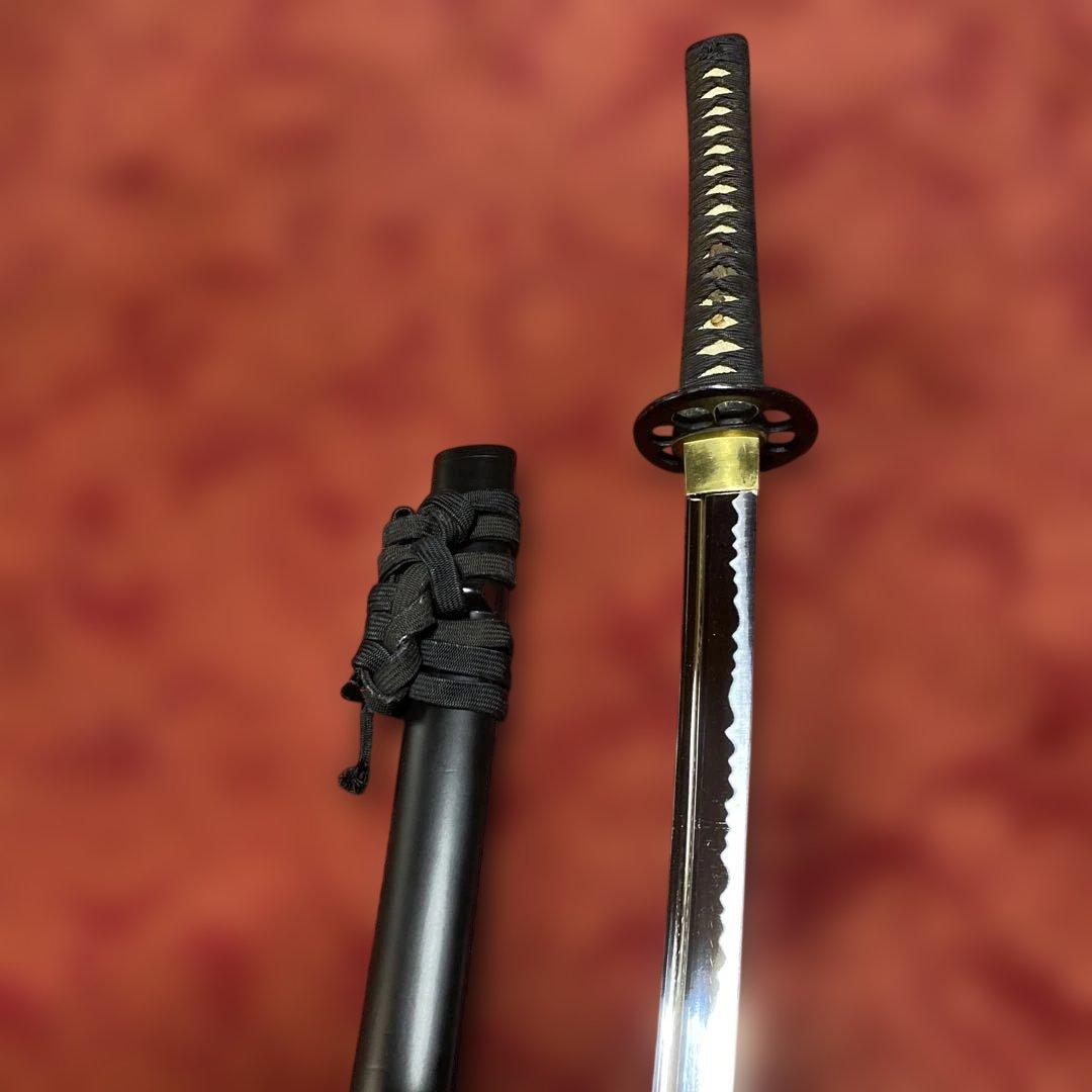 高級居合刀 黒柄 蓮根輪切透し丸鍔 黒呂鞘 - メルカリ