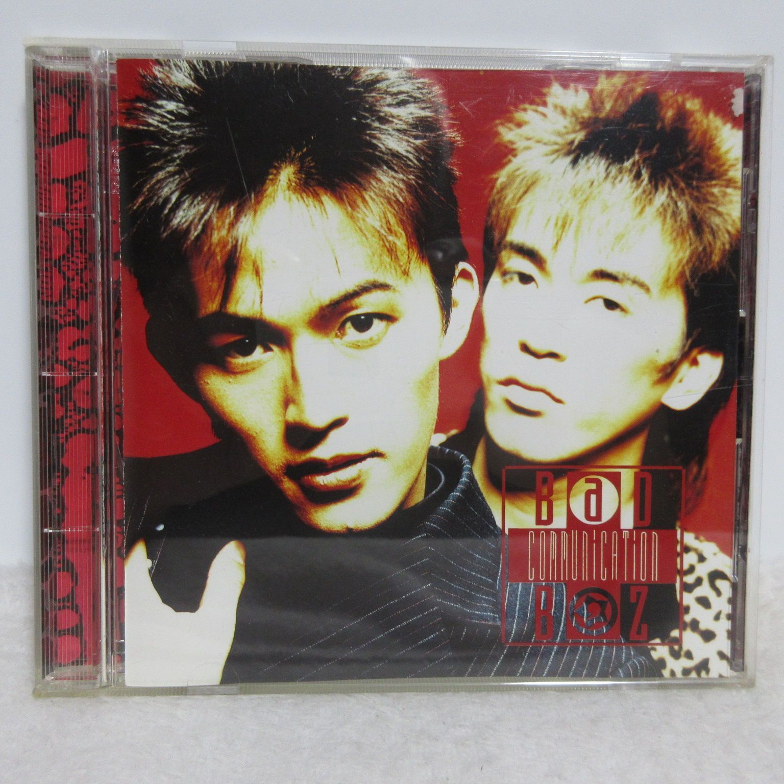 CD】B'z／BAD COMMUNICATION - メルカリ