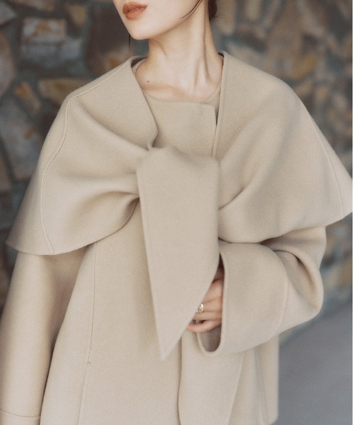 anuans（アニュアンス）の「リバーウールミドルマフラーコート（ノー