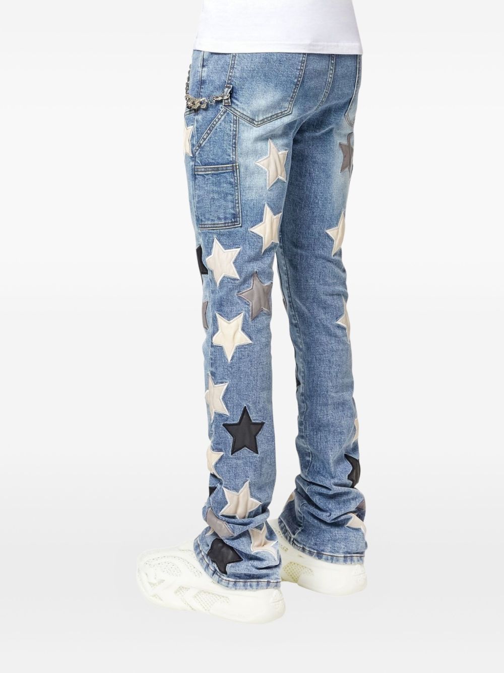 GUAPI star-patches chain-link Denim Jeans | Blue | FARFETCH