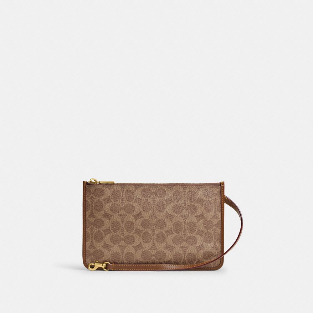 COACH® AD | New York Zip Pouch In Signature Canvas