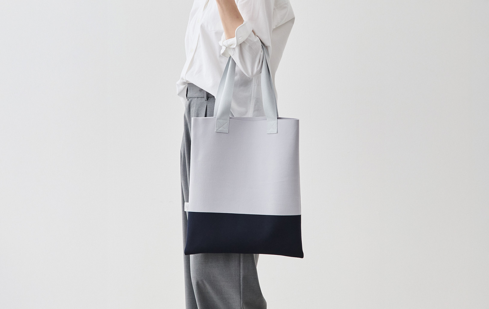 撥水ニット・バイカラートート/アイボリー×オレンジ | Factelier